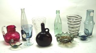 A collection of assorted glassware, to include an art glass vase, cranberry glass pouring jug,