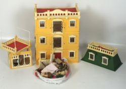 A Sylvanian Families mansion and figures,