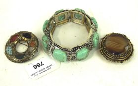 A Mexican Turquoise mounted expanding bangle,