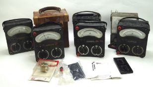 A collection of Avometers and accessories, including three Avometer 8s,
