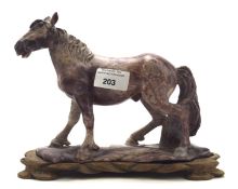 A contemporary agate model of a horse, in purple, with a carved mark to the base,