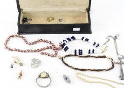 An assortment of vintage costume jewellery,