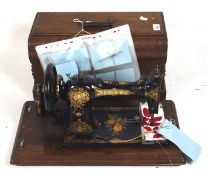 A late 19th century sewing machine by C S Jones, type 4, serial number 21552,