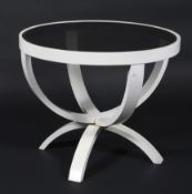 A retro circular bentwood coffee table with smoked glass top,