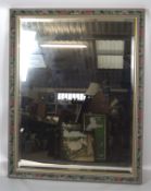 A large contemporary framed wall mirror, of rectangular form,