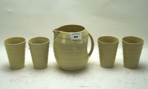 A 20th century ceramic lemonade set, comprising a jug and four beakers,