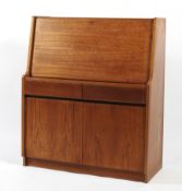 A teak mid century style drop front bureau,