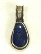 A contemporary silver mounted black opal doublet pendant