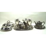 Collection of silverplate, including teapots, a tureen, pair of vases, a twin handled tray,