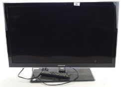 A Samsung flat screen TV, type UE32D5000,