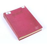 A signed copy of Enid Blyton's 'Book of the Year', bound in red fabric,