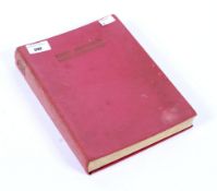 A signed copy of Enid Blyton's 'Book of the Year', bound in red fabric,