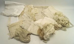 An assortment of 19th and 20th century lace and fabric, including trims, doilies, placemats,