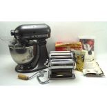 A modern kitchen aid artisan mixer, model SKSM150,