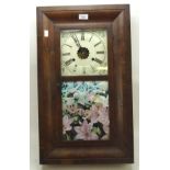 A Victorian wall clock, the painted enamel dial with Roman numerals and floral details,