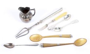 A collection of silverware, to include a late Victorian silver cream jug,
