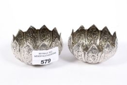A pair of silver Oriental open salts, in the forms of Lotus flowers,
