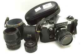 A selection of vintage camera equipment, to include a Praktica super TL camera