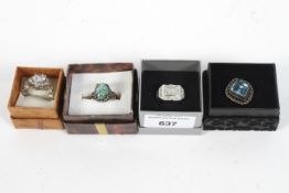 Four boxed 925 silver rings, each set with stones or paste,