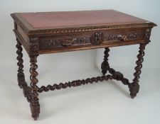 A late 19th century dark stained oak table with carved sloping perimeter,