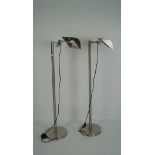 Two modern chrome floor lamps with shaped shades, height 116cm,