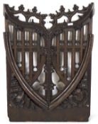 A large carved and pierced stained wooden crest, possibly from a Church,