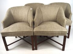 A set of four 20th century chairs, upholstered in grey fabric and with wooden frames,