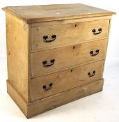 A 20th century pine chest of drawers with three drawers,