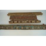 A quantity of wooden mouldings carved with various foliate designs,