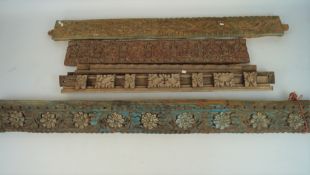 A quantity of wooden mouldings carved with various foliate designs,