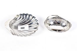 A silver dish of Scallop form and a pierced swing handled dish,