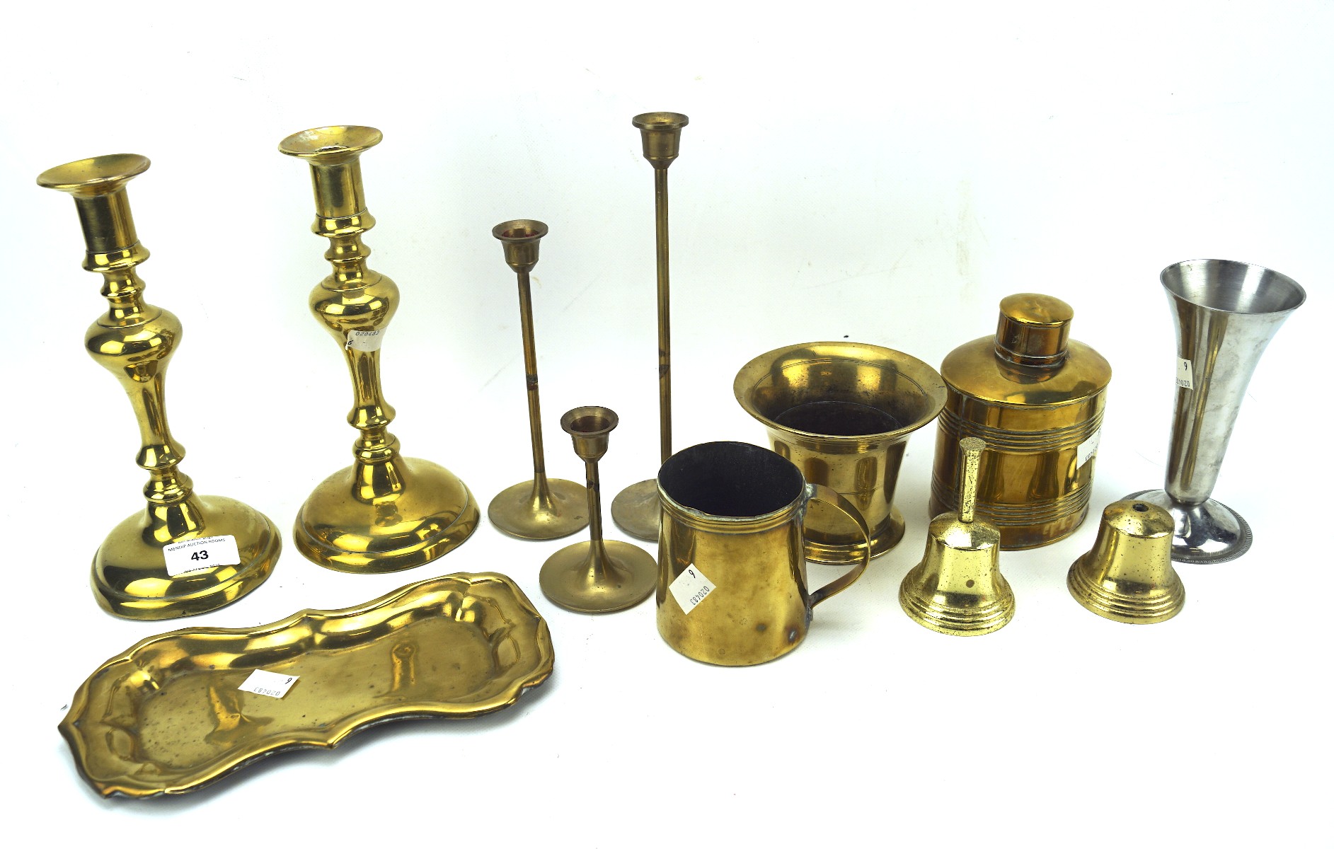 A collection of brassware,