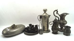 A collection of 19th & 20th century pewter, including candlesticks a tankard,
