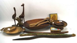 A collection of treen, including bowls, animal sculptures,