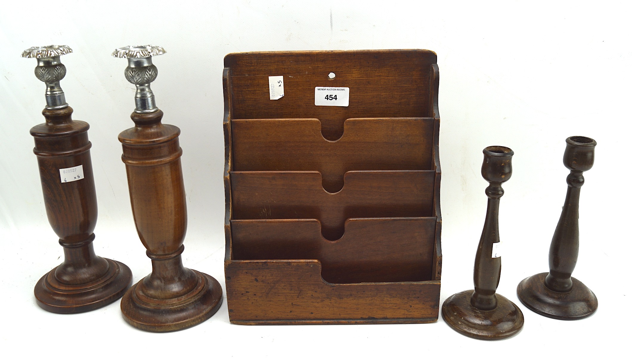 Two pairs of wooden candlesticks and letter rack,