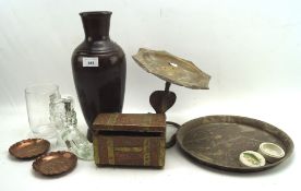 An assortment of metalware, including a copper and brass 'Tea' box, a cake stand, vase and more,