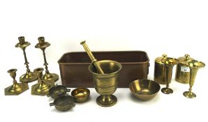 An assortment of brassware,