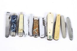An assortment of 20th century pen knives and fruit knives,