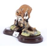 A Border Fine Arts figure group depicting a Fox perched on a log,