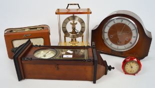 A group of vintage clocks,