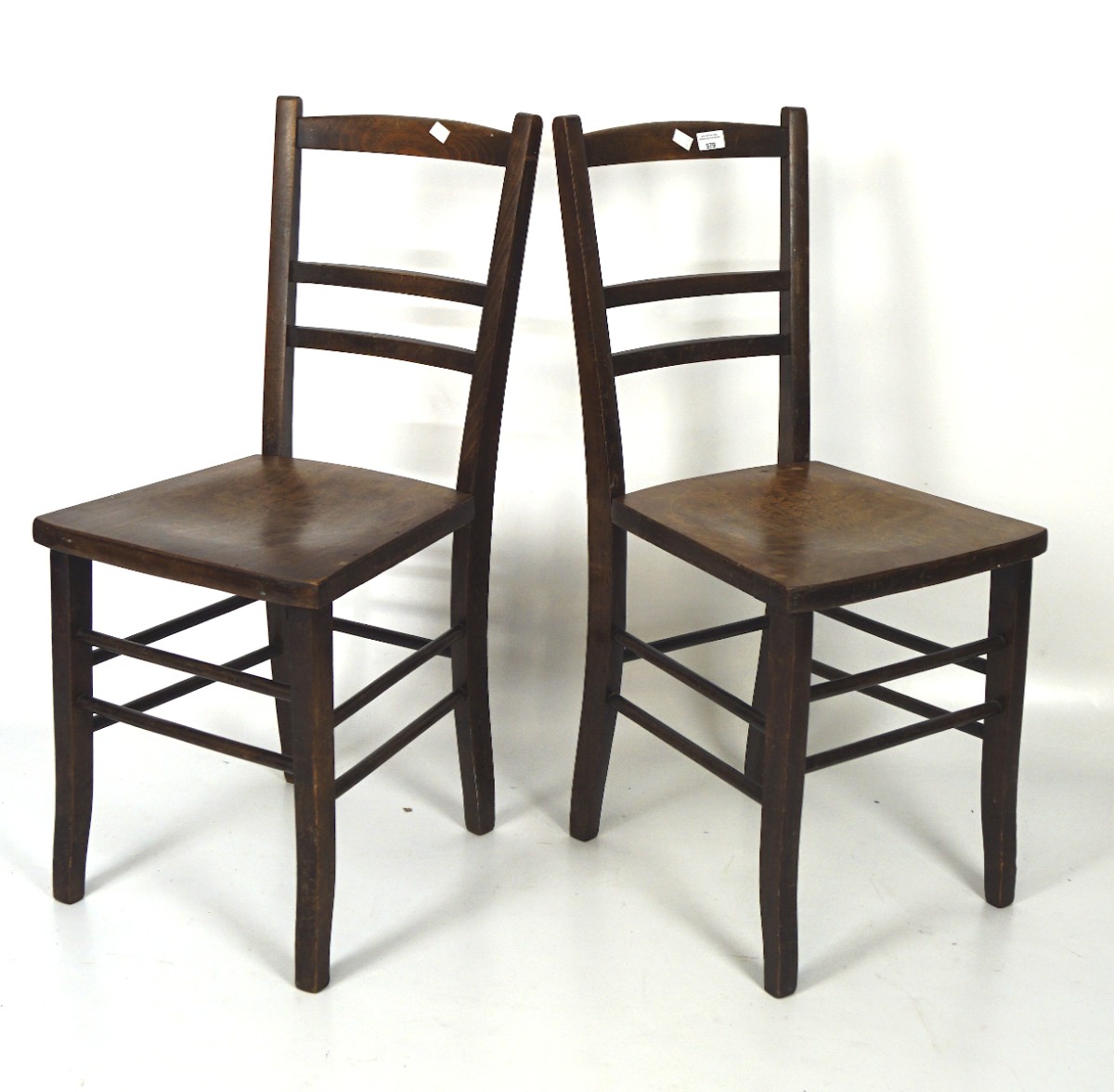 A pair of early 20th century cafe style chairs,
