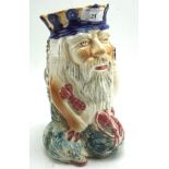 A Staffordshire jug pitcher modelled as Neptune,