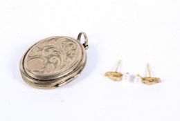 A pair of 9ct gold and seed pearl set earrings,