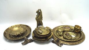 A collection of assorted brass ware, including dishes with engraved decoration,