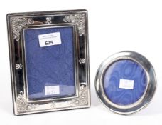 Two contemporary silver mounted photo frames,