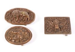 A set of three Tibetan/Chinese metal belt buckles,