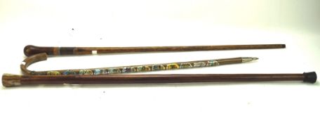 Three 20th century walking canes,