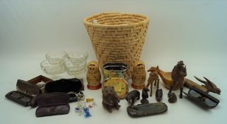 A group of collectables including four small wood Black Forest bears and a hunter, height 13cm,