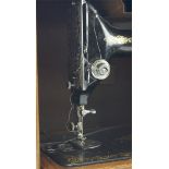 A 20th century Singer sewing machine,