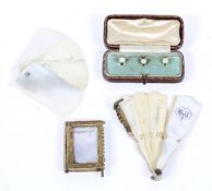 A 19th century Grand Tour souvenir book-shaped aide memoire, and three collar studs, in a case